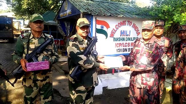 bgb bsf exchange sweets at hili border