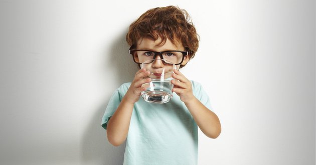 drinking water while standing