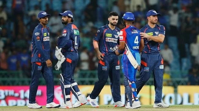 a dejected lucknow super giants side shakes hands with shai hope