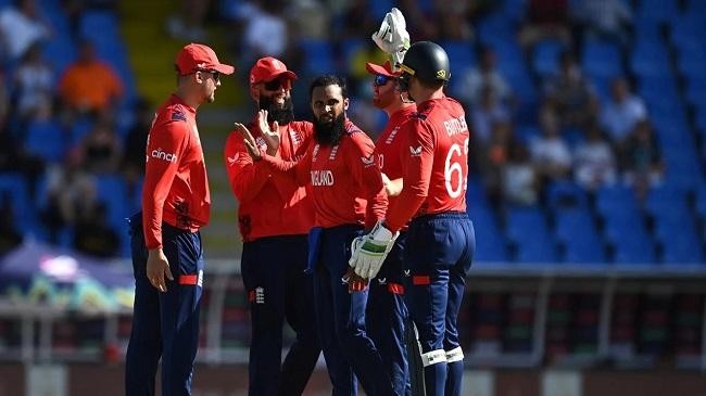 adil rashid celebrates the wicket of mehran khan