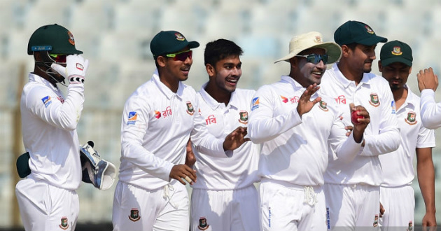 bangladeshi fielders are celebrating a wicket