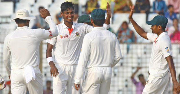 mustafiz celebrating after taking an australian wicket