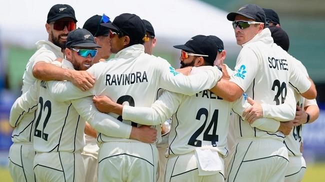 new zealand players huddle up after a wicket