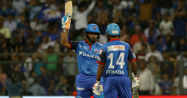 rishabh pant raises his bat after his blistering half century