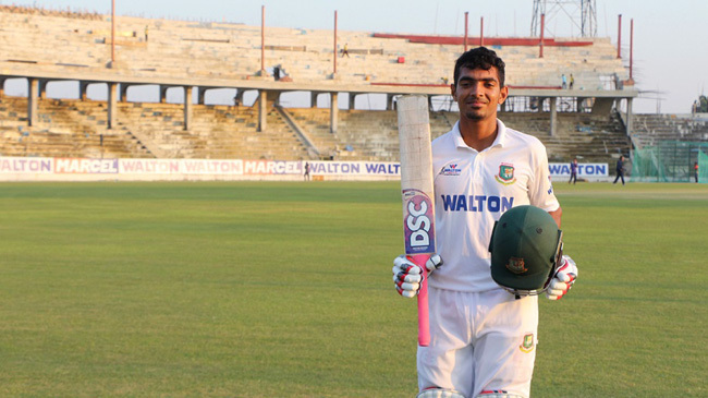 saif hassan poses at stumps