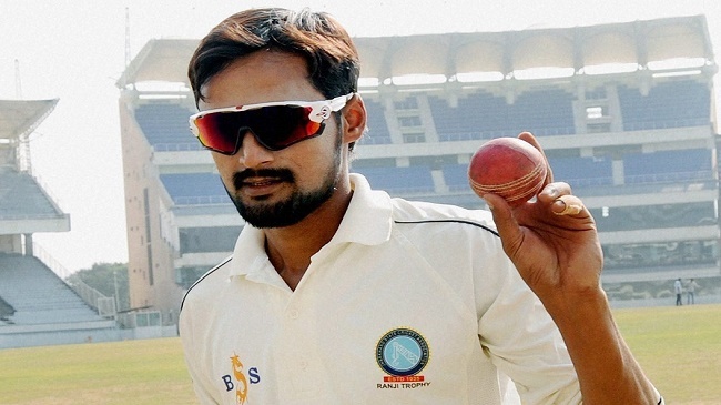 shahbaz nadeem poses for a photo