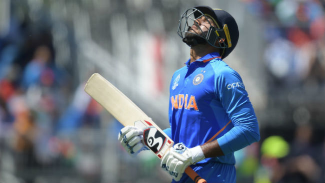 shankar leaves the pitch after losing his wicket