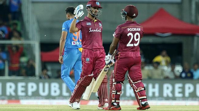 simmons pooran celebrate victory