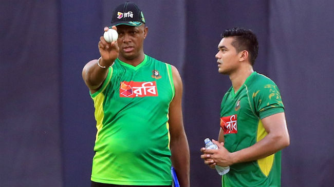 taskin receives some tips from walsh