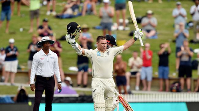 tom latham celebrates