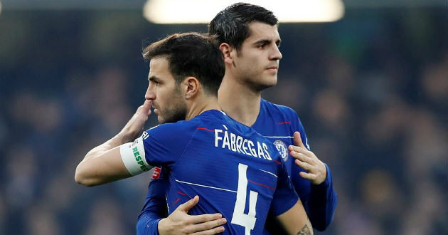 fabregas embraces team mate morata