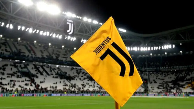 juventus flag man in field