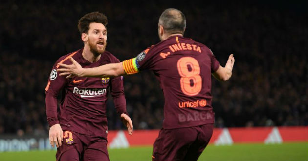 messi and iniesta celebraing a goal