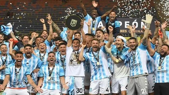 racing club celebrating their trophy