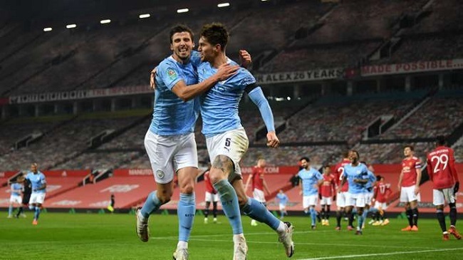 stones celebrates a goal