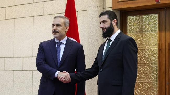 ahmed al sharaa sharaa and turkish fm hakan fidan