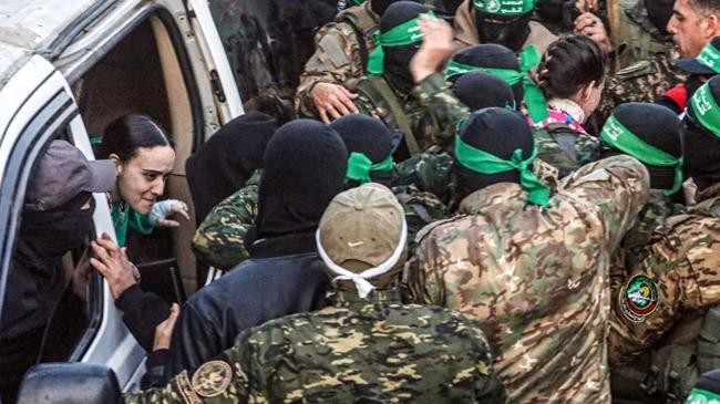 al qassam brigades hands over 3 israeli hostages to red cross