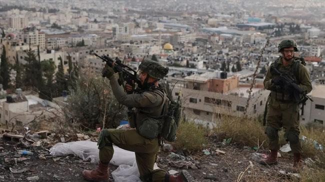 an israeli soldier during a raid at the balata refugee camp east of nablus in the occupied west bank