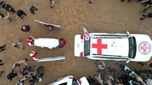 bodies of the bibas family three members and oded lifshitz are handed over to the red cross teams