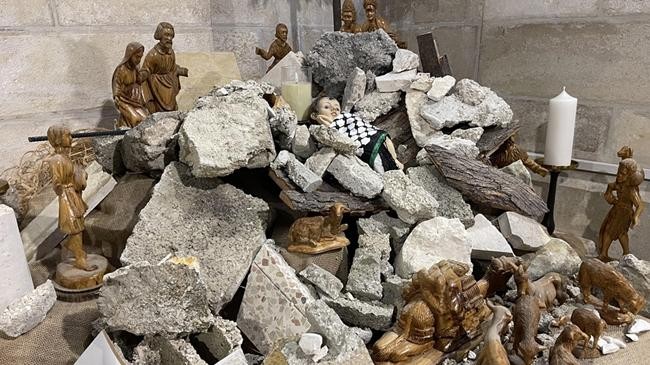 church in palestine decorates christmas tree using debris