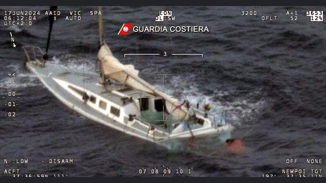 italian coast guard shows a sail boat used by migrants half sank in the mediterranean sea between italy and greece early monday june 17 2024