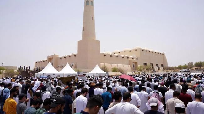 people perform prayer for the funeral ceremony of haniyeh