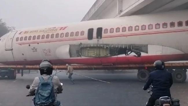 plane under bridge