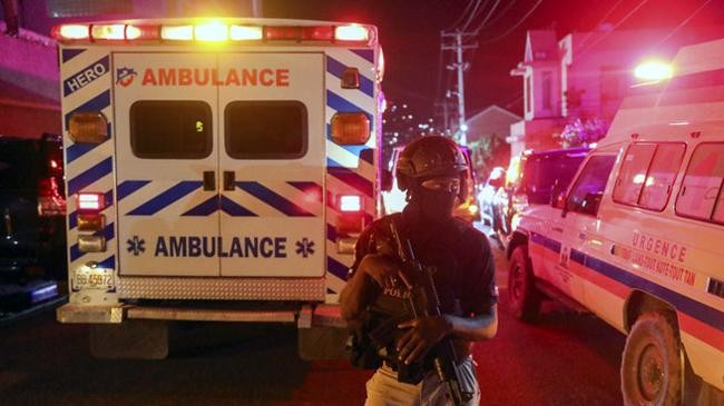 police guard outside the hospital where haitis newly selected prime minister garry conille was hospitalized