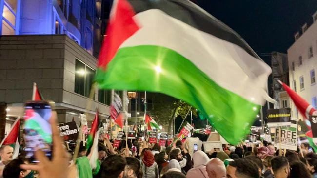 pro palestinian demonstrators gathered close to the israeli embassy in london on monday evening