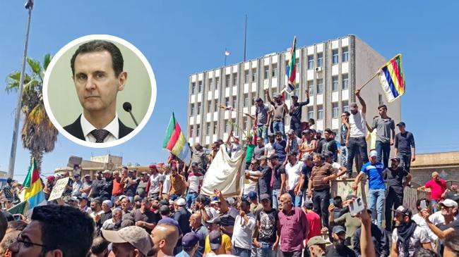 protests in southern syria over economy now target president