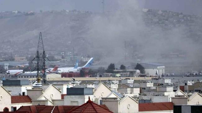 smoke rises from a deadly explosion outside the airport in kabul 1