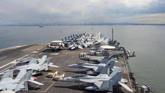 uss carl vinson cvn 70 sets anchors in manila