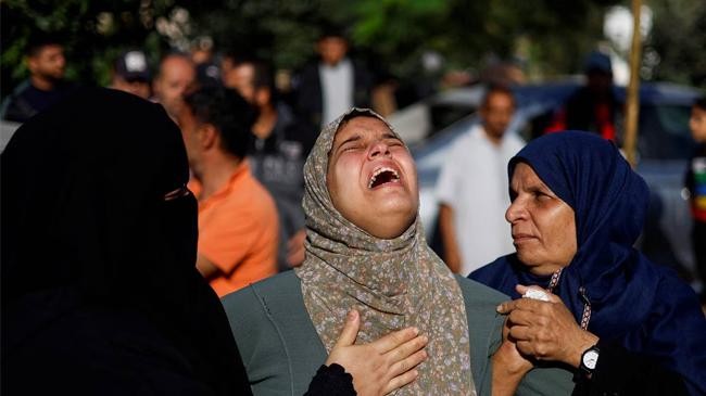 woman of gaza cry